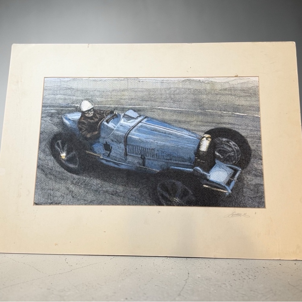 Vintage Blue Racing Car Art matted and signed by artist.